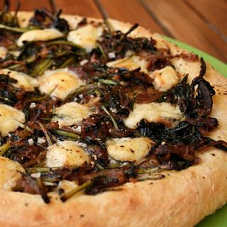 Dandelion Greens And Caramelized Onion Pizza
