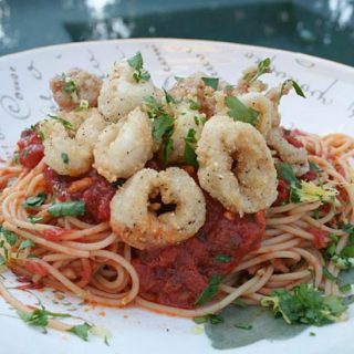 Spaghetti With Spicy Tomato Sauce And Fried Calamari