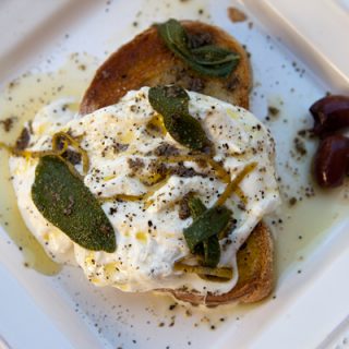 Buratta Cheese On Toasted Bread With Anchovy & Lemon Dressing