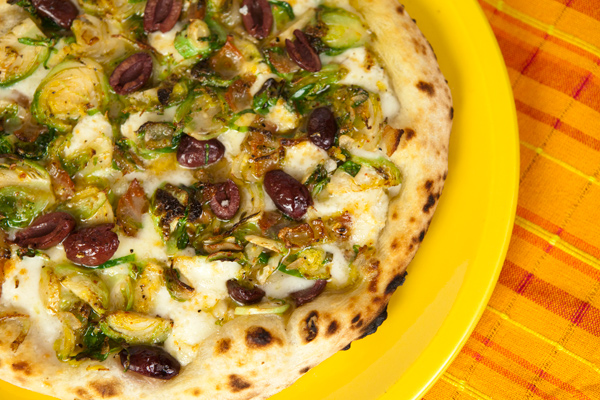 Brussels Sprouts Pizza With Guanciale & Kalamata Olives