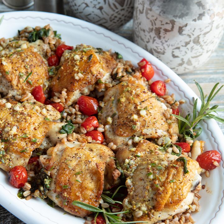  Herbed Golden Brown Chicken Thighs With Farro, Spinach, And Burst Tomatoes