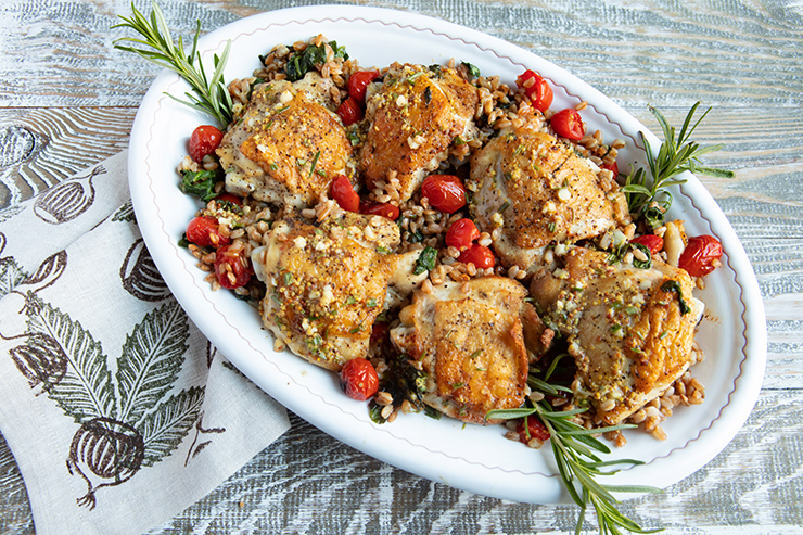 Herbed Golden Brown Chicken Thighs With Farro, Spinach, And Burst Tomatoes