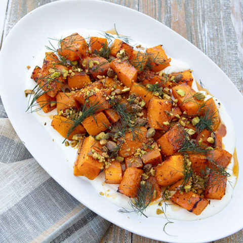 Roasted Squash With Whipped Feta, Pistachios, and Hot Honey